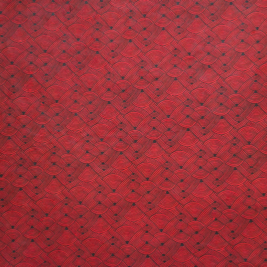 Nepalese handmade decorative lokta paper sheet with a fine lined black knots pattern screen printed on a red lokta paper.