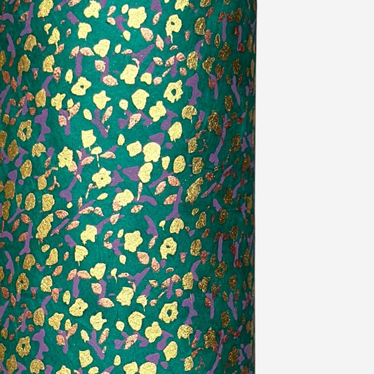 A delicate floral pattern in gold, blush and lilac screen-printed by hand on emerald lokta paper.