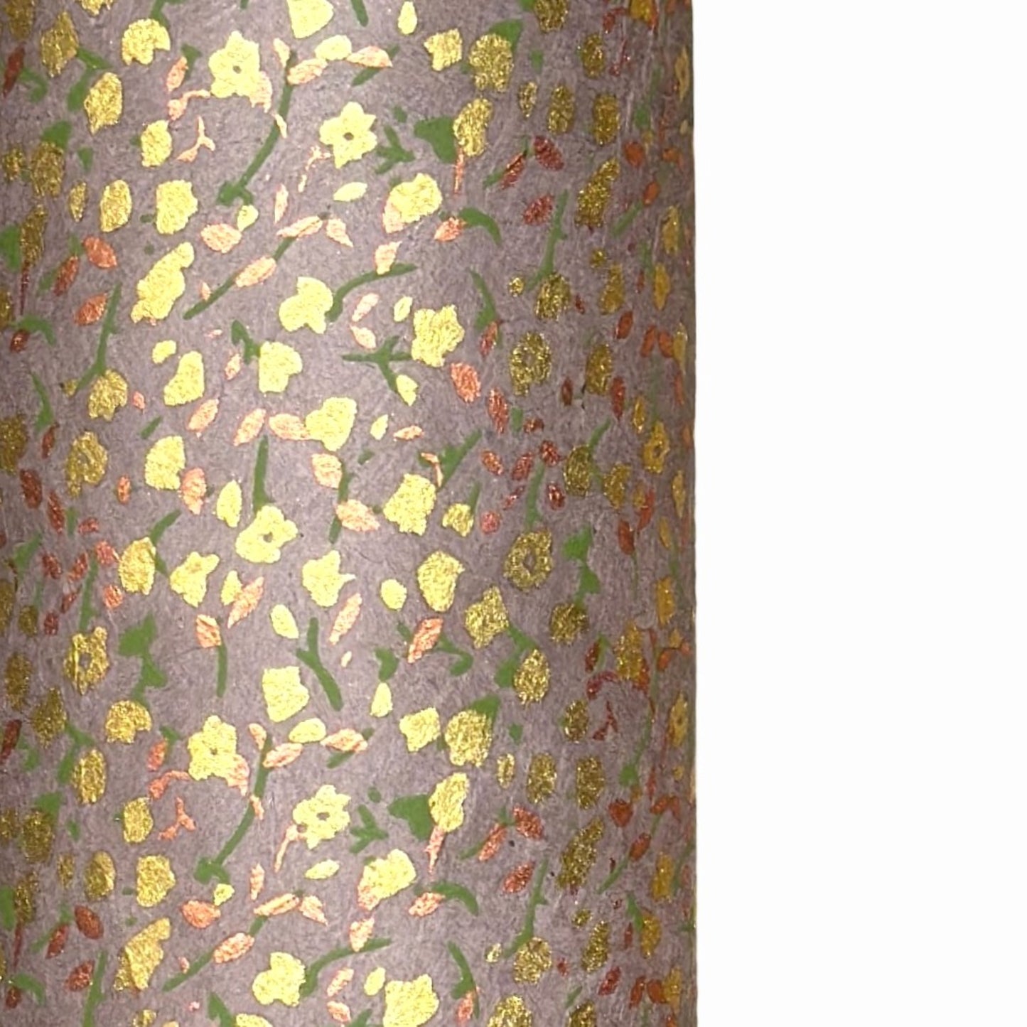 A delicate floral pattern in gold, blush and green screen-printed by hand on muted lavender lokta paper.