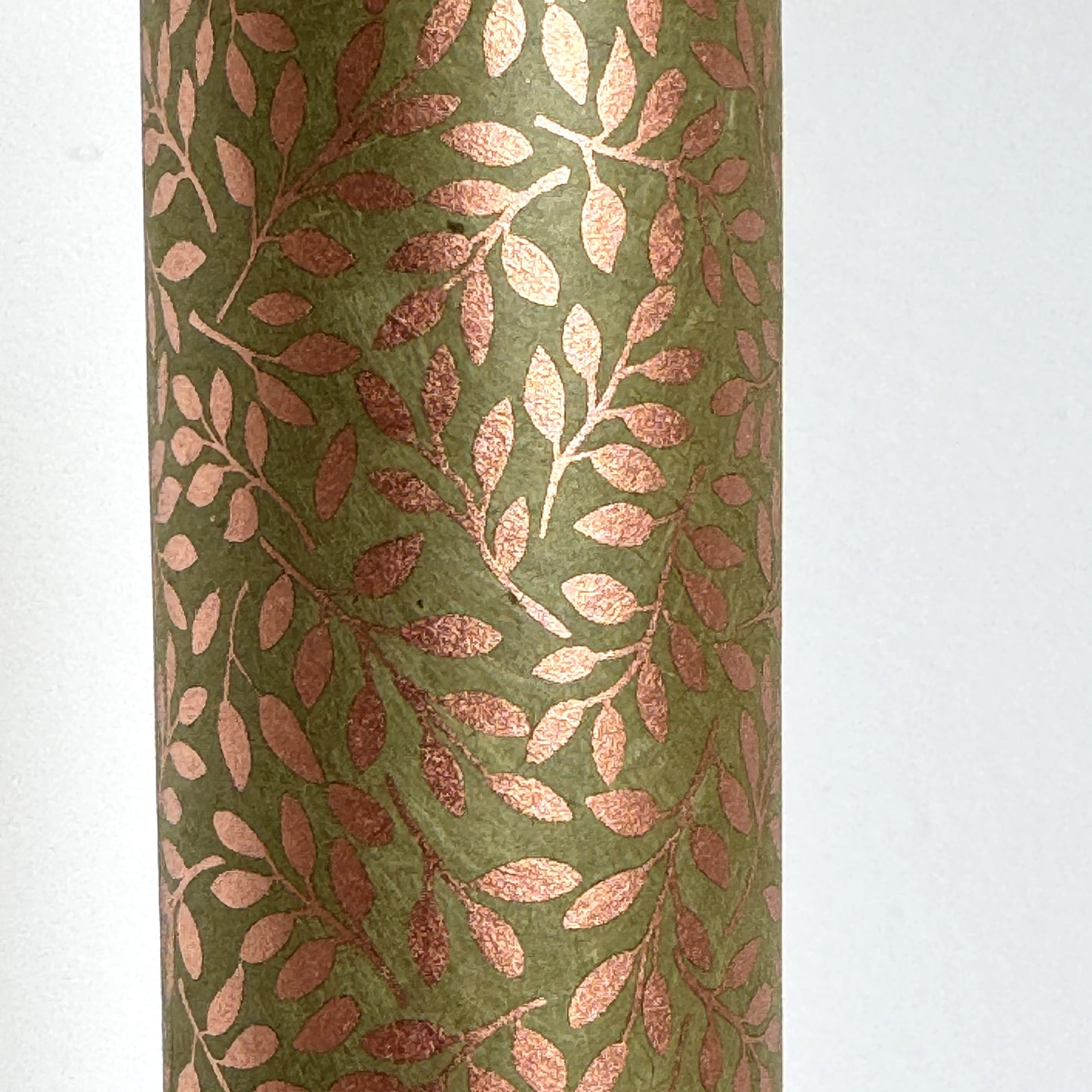 Nepalese handmade decorative lokta paper sheet with a metallic copper willow design screen printed on a dusty moss green lokta paper.