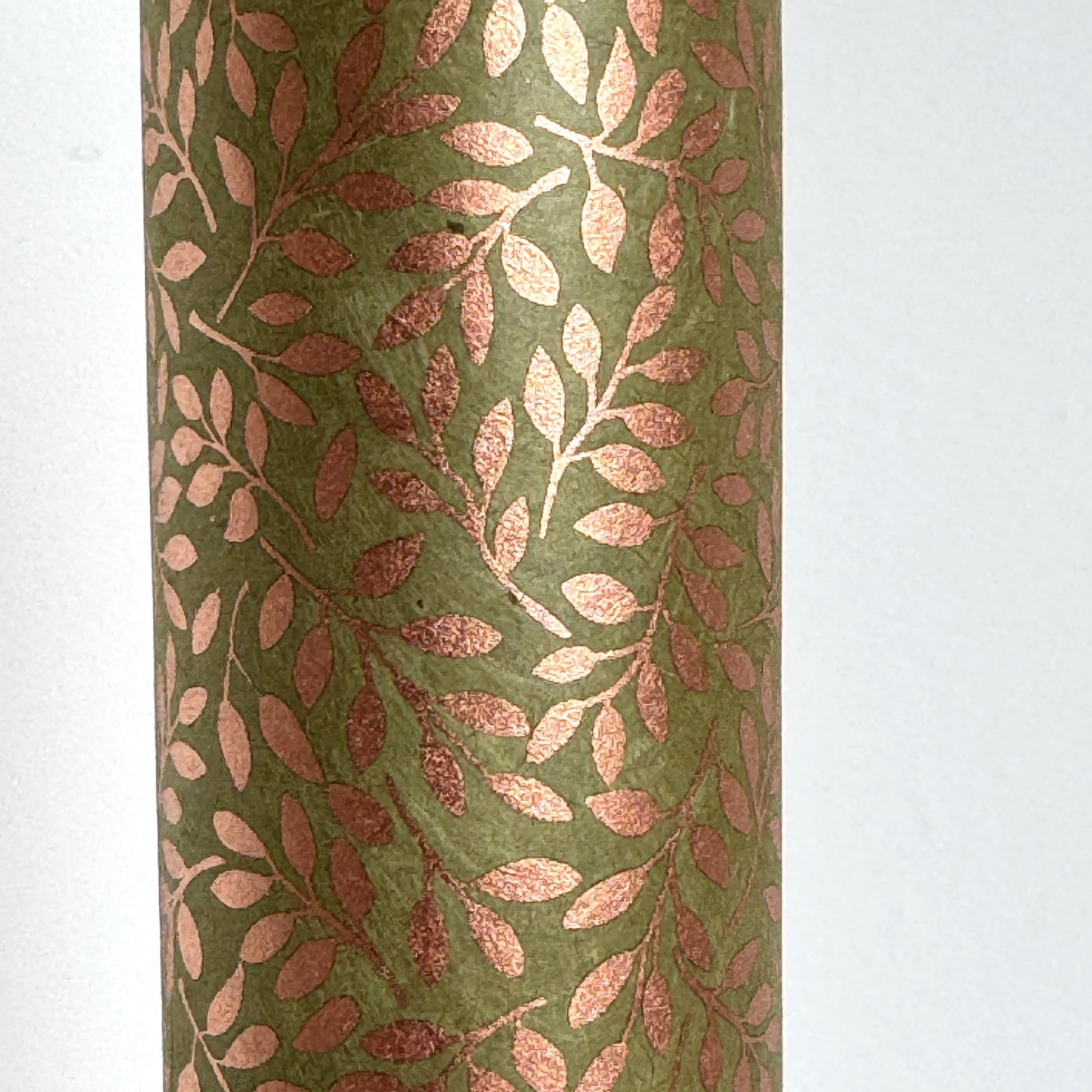 Nepalese handmade decorative lokta paper sheet with a metallic copper willow design screen printed on a dusty moss green lokta paper.