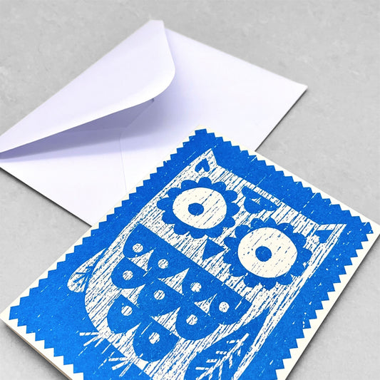 Small greetings card of a block printed woodland owl in blue and white by Lisa jones Studio