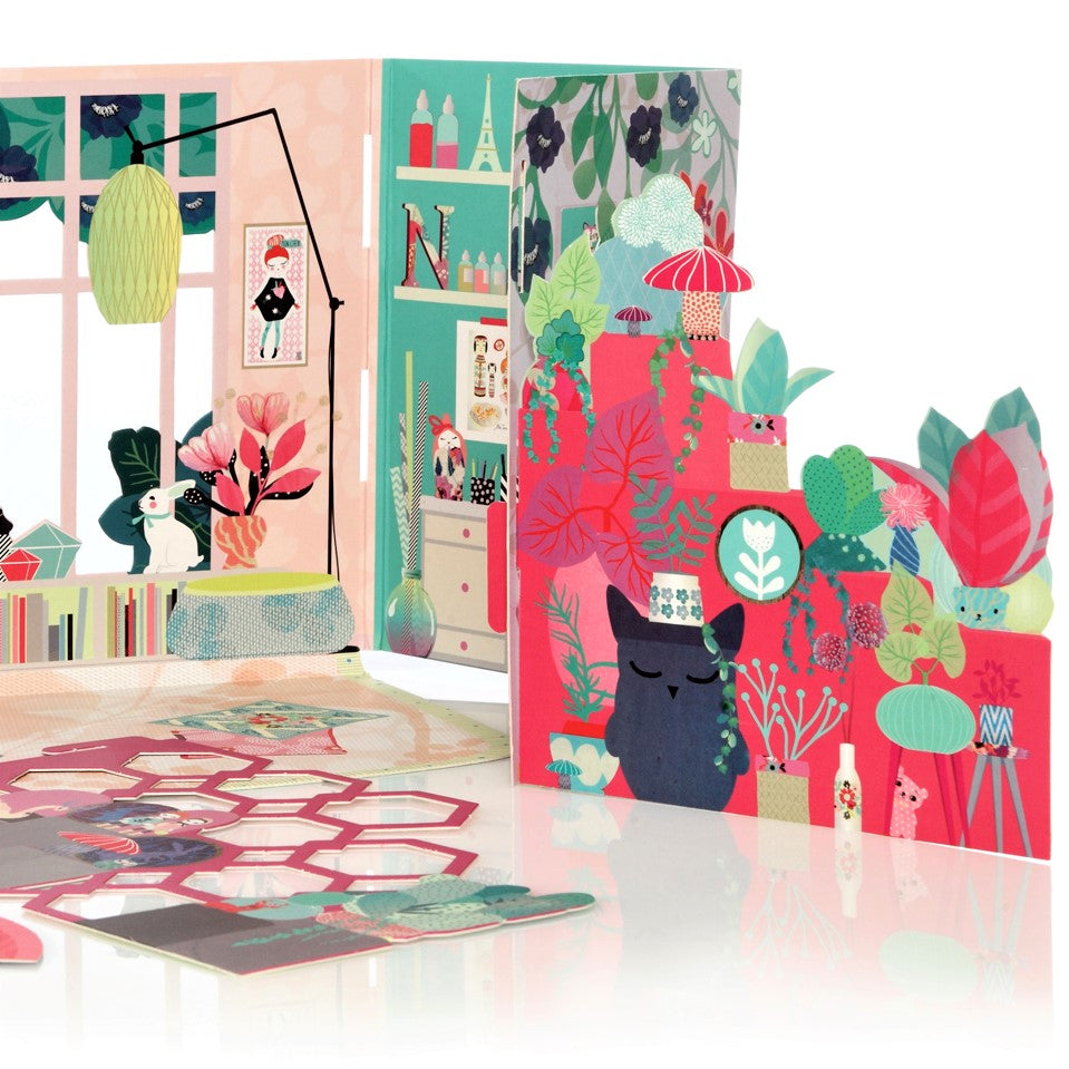 A paper doll's house kit by Mon Petit Art. La Maison, Bienvenue chez Izumi Idoia Zubia. Image of the colourful doll's house that can be created. Close-up