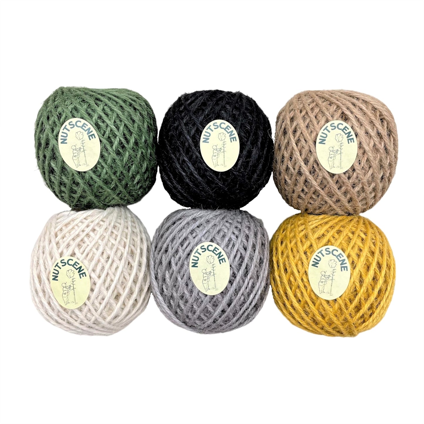 Set of 6 balls of jute twine by Nutscene. Colours are green, black, natural, white, grey and mustard.