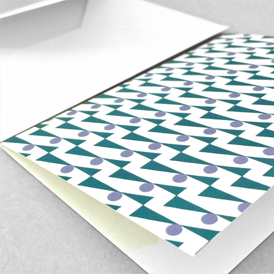 greeting card with geometric triangle and dot repeat pattern in teal and lilac by Ola Studio