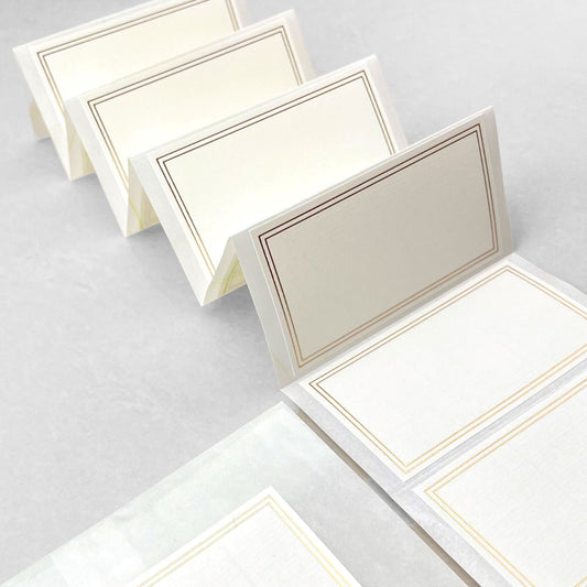 Pack of 10 self-adhesive white labels with double lined gold brass foiled border, by Ola Studio
