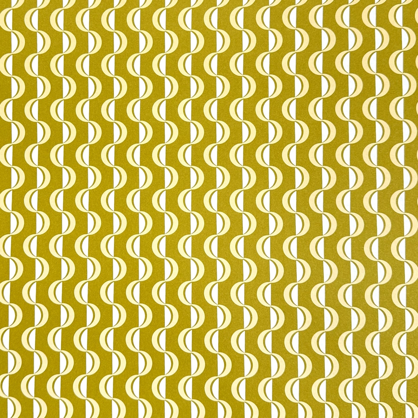 wrapping paper by ola studio with a wavy stripe design in chartreuse and lemon.
