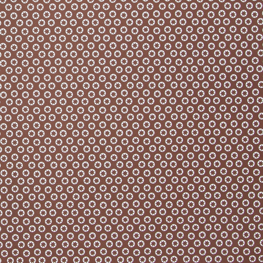wrapping paper with an abstract tiny stars pattern in chestnut brown and white by Ola Studio