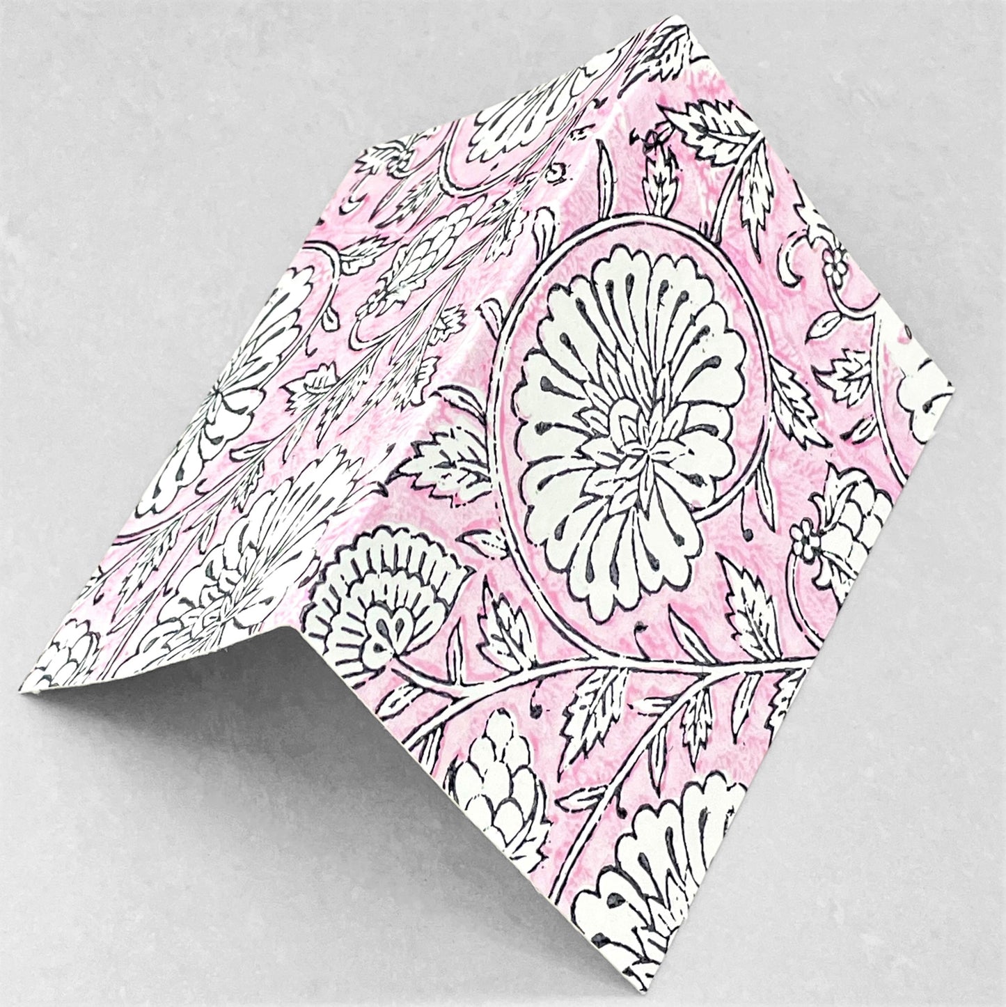 Hand block printed greetings card with repeat floral pattern in pink and cream, by Paper Mirchi