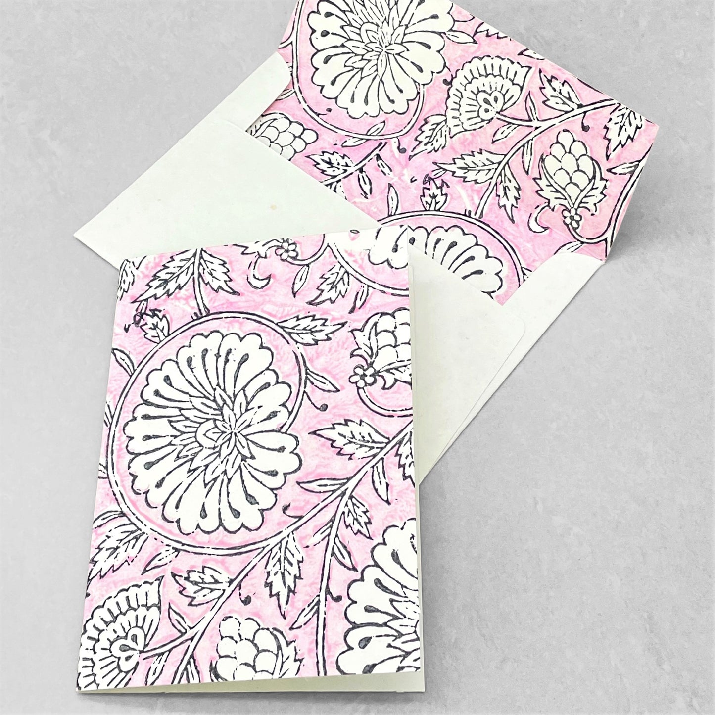 Hand block printed greetings card with repeat floral pattern in pink and cream, by Paper Mirchi