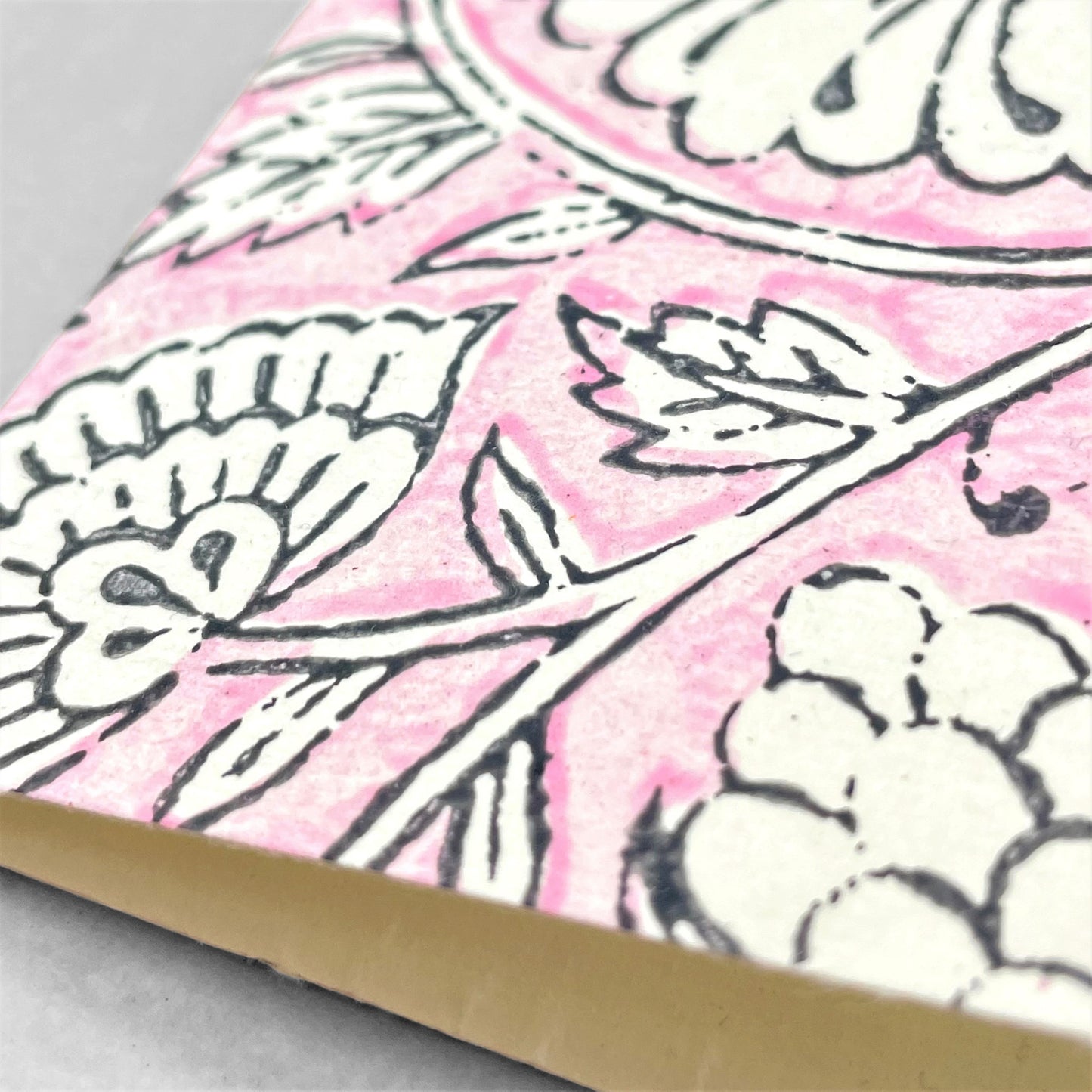 Hand block printed greetings card with repeat floral pattern in pink and cream, by Paper Mirchi