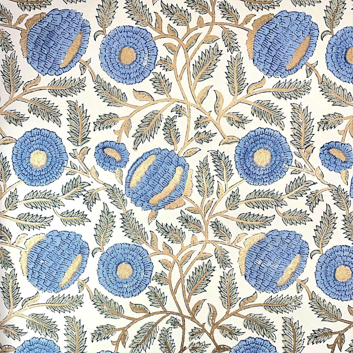 wrapping paper with repeat botanical pattern in blue, gold and green by Paper Mirchi