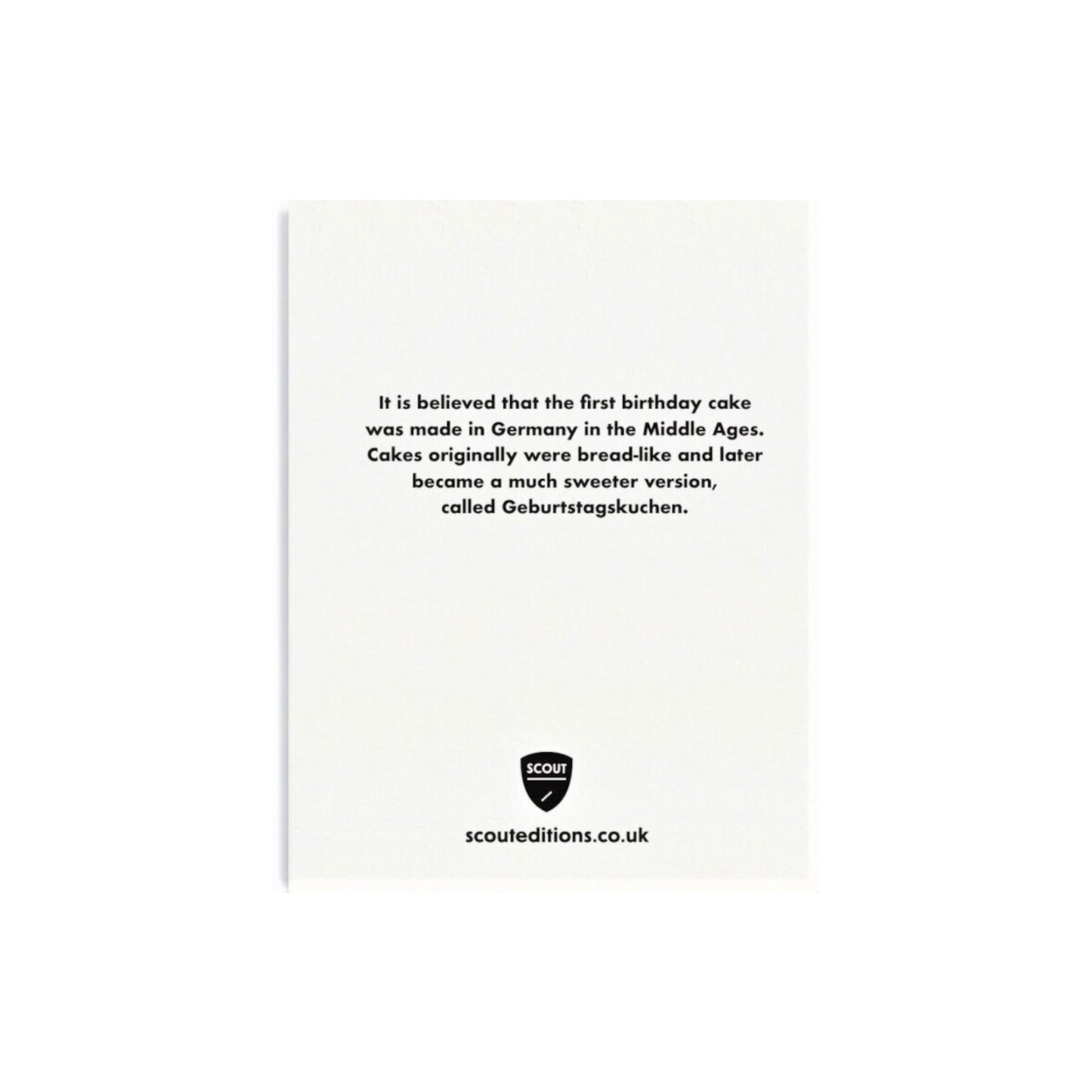 mini greetings card with image of a cake with pink icing and a cherry. By Scout Editions.  Reverse of card.