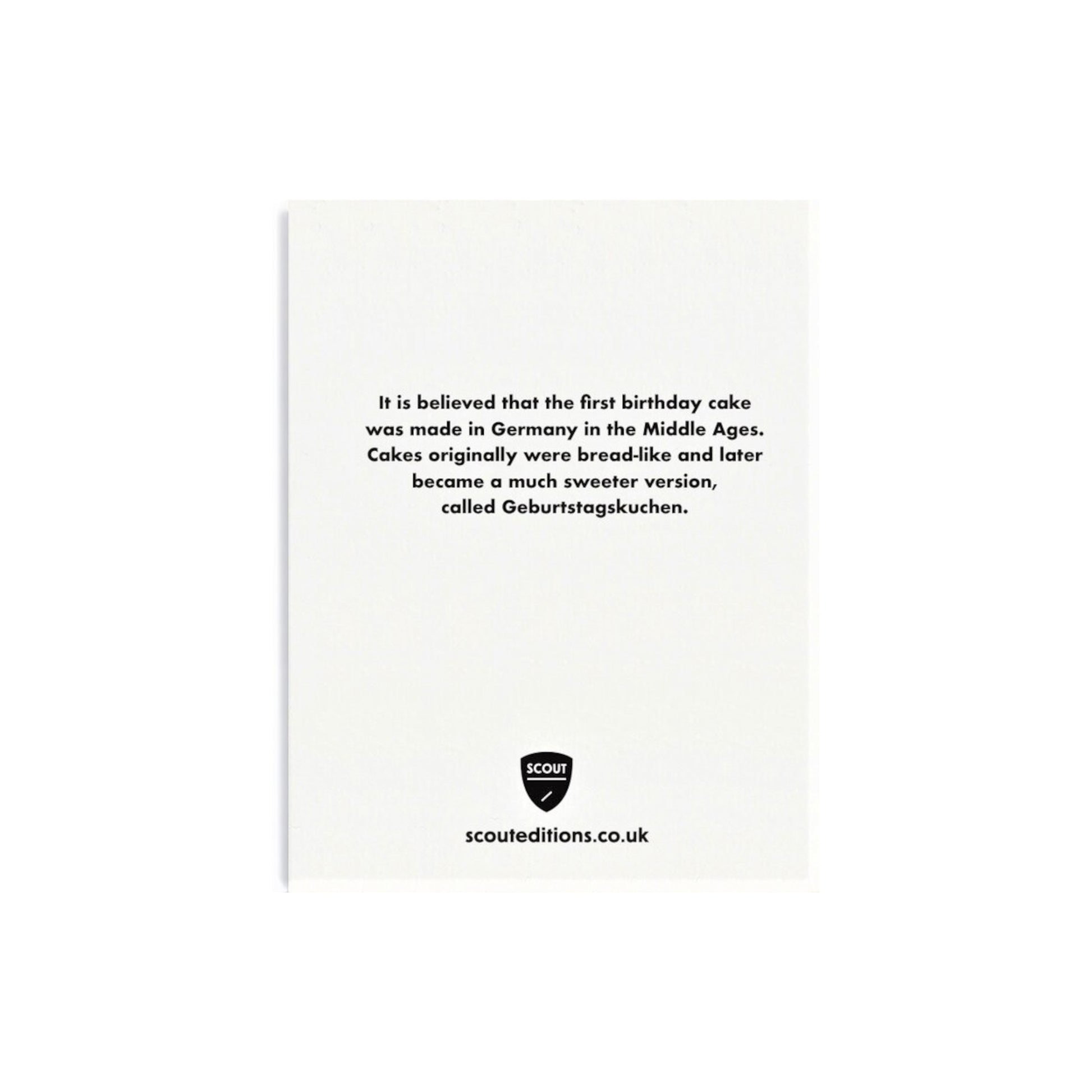 mini greetings card with image of a cake with pink icing and a cherry. By Scout Editions.  Reverse of card.