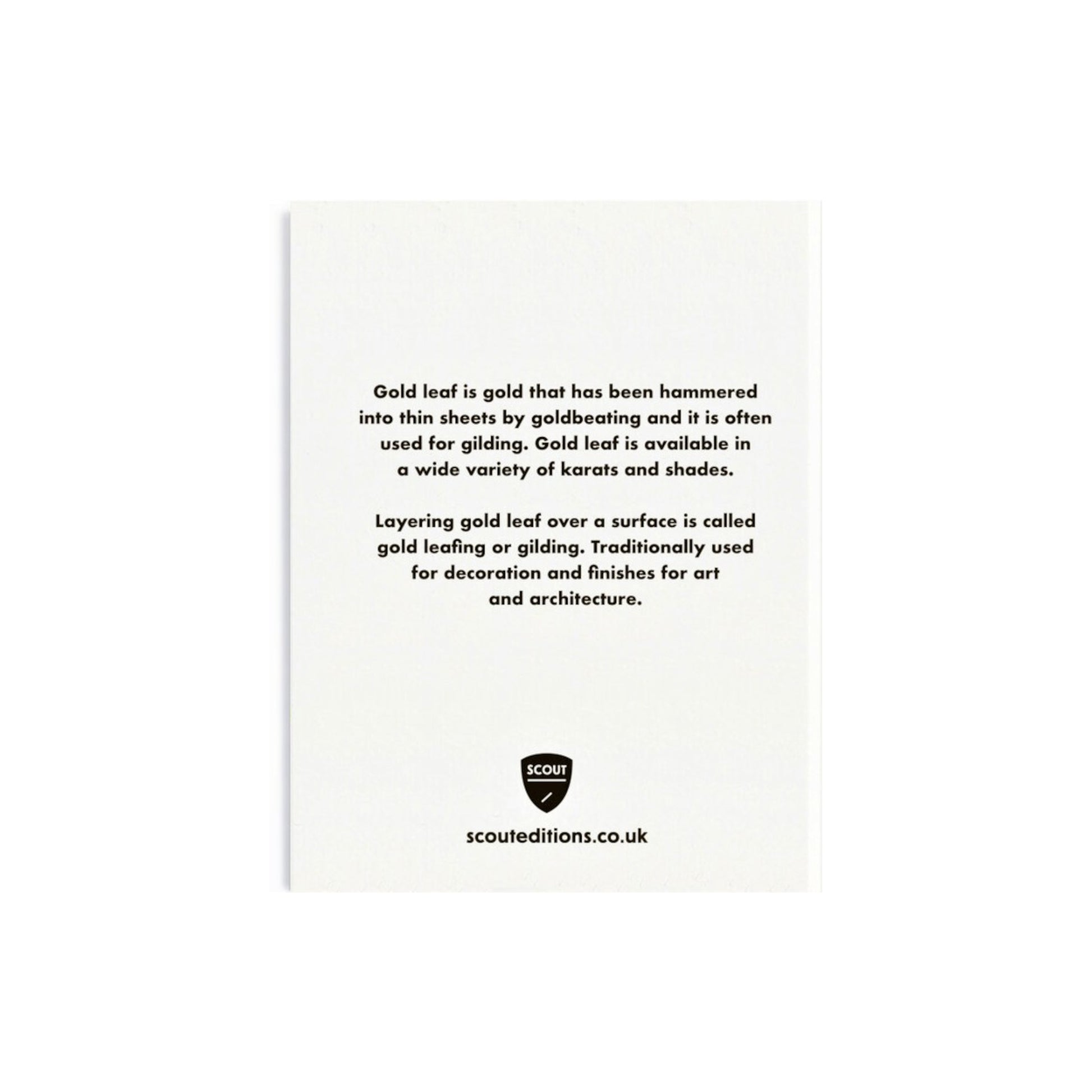 Mini greetings card with an image of a gold oak leaf with a smily face. By Scout Editions. Reverse of card