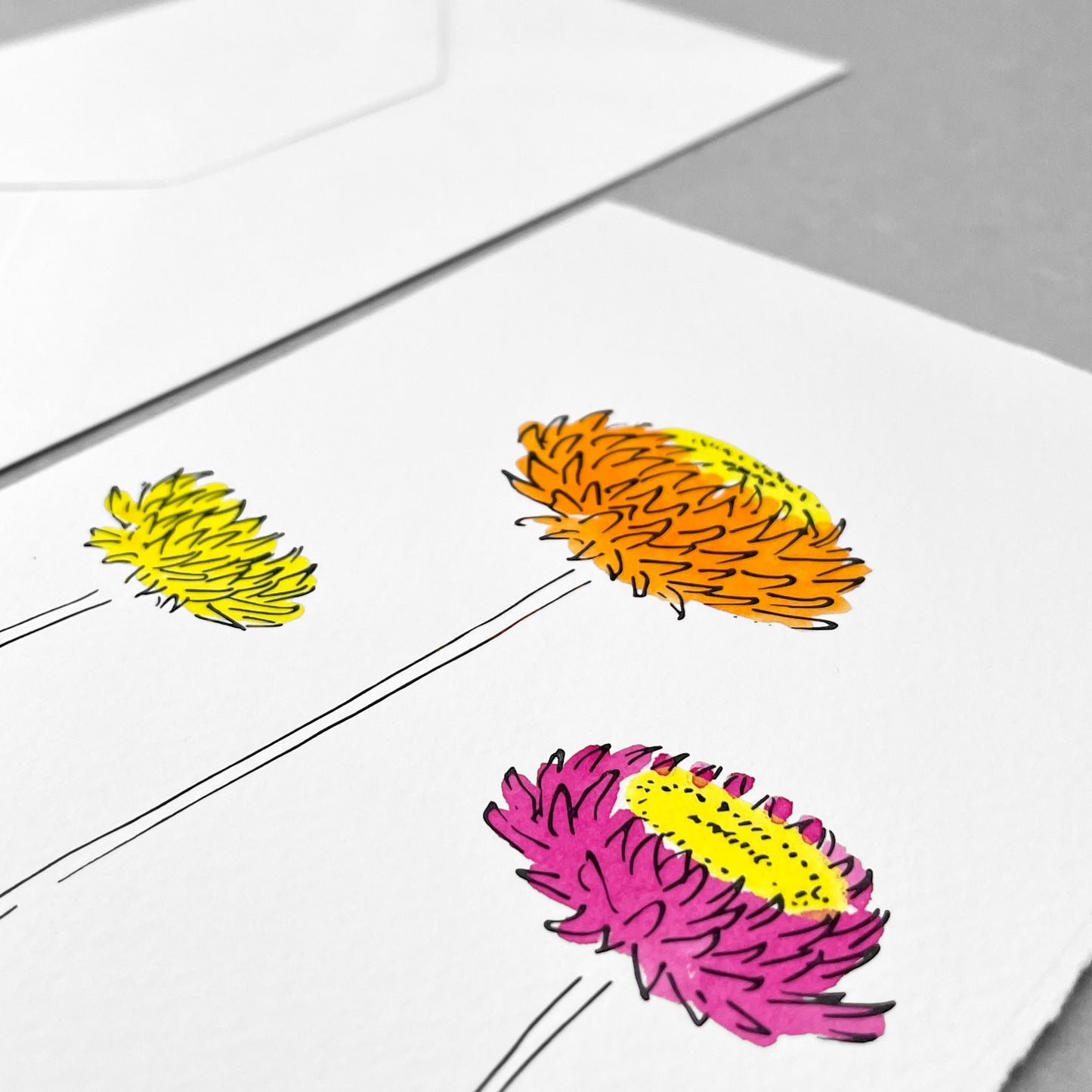 hand-painted greetings card of three flowers in yellow, orange and fuschia, by Scribble and Daub