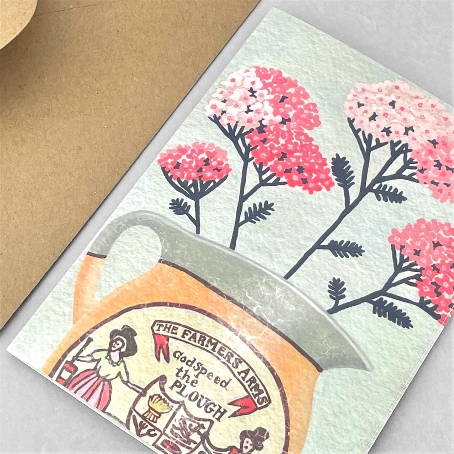 greeting card of a painting of stems of pink yarrow in a harvest themed jug by Susie Hamilton