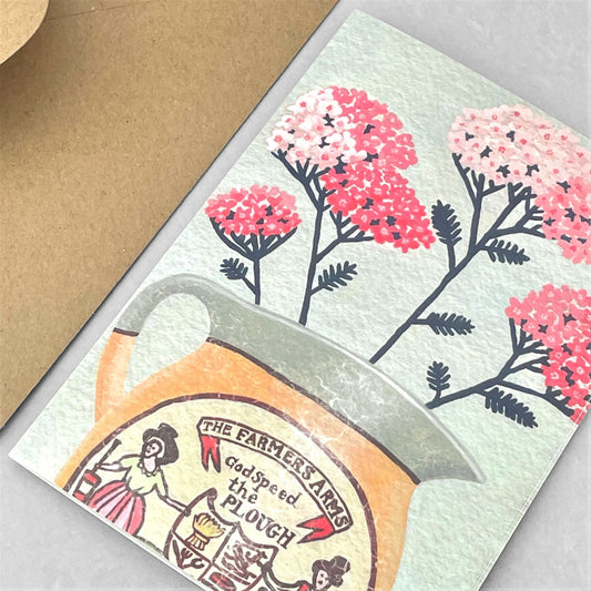 greeting card of a painting of stems of pink yarrow in a harvest themed jug by Susie Hamilton