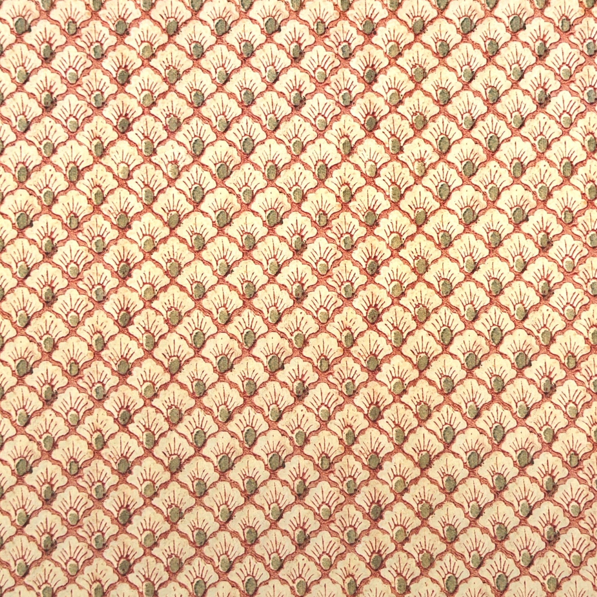 a sheet of italian wrapping paper with a shell repeat pattern in soft coral, cream and olive green
