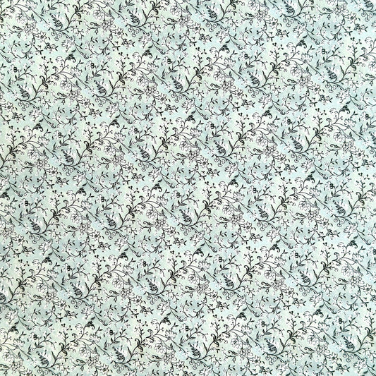 floral italian florentine wrapping paper with a white repeat floral on a mustard background