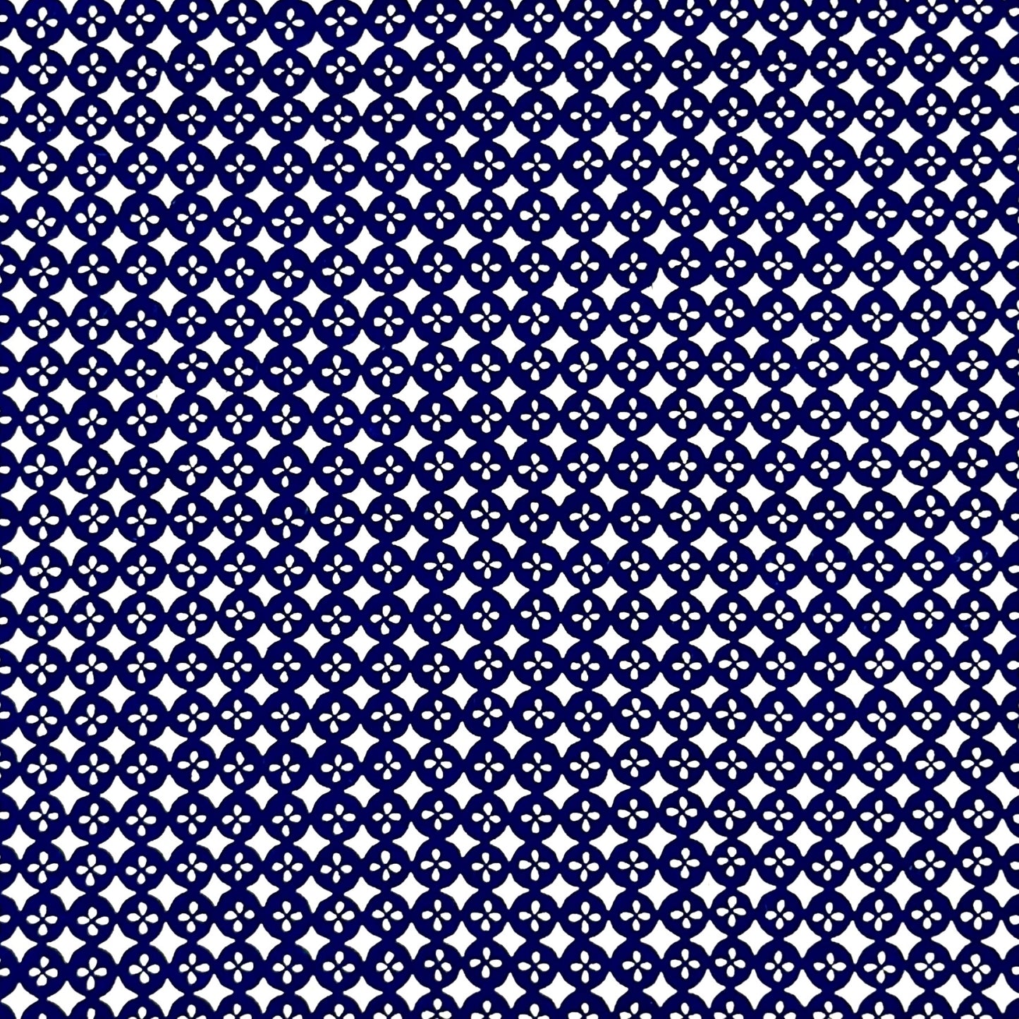 vintage katazome-shi stencil-dyed small papers from Japan. blue circle pattern on white background.
