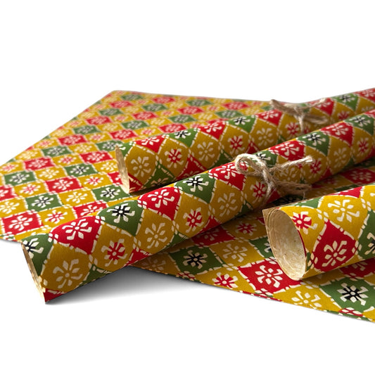 vintage katazome-shi stencil-dyed small papers from Japan. Japanese check pattern in mustard, red and green. Pictured rolled.