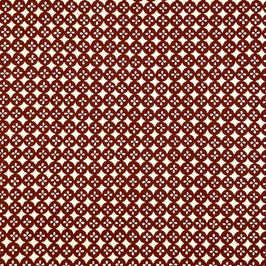 vintage katazome-shi stencil-dyed small papers from Japan. Cream paper with terracotta circles pattern.