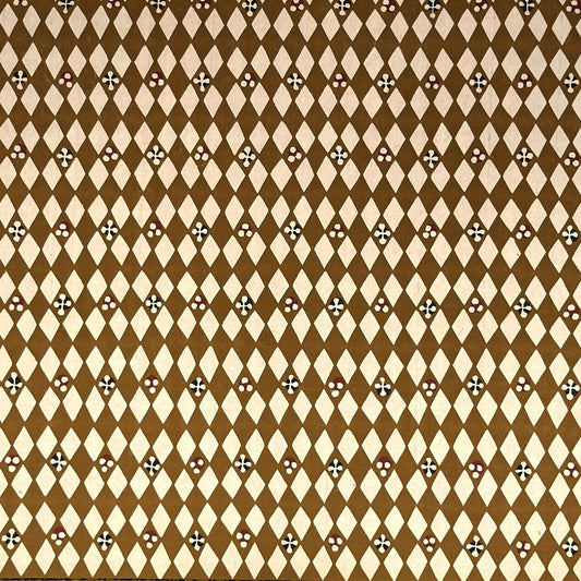 vintage katazome-shi stencil-dyed small papers from Japan. Cream paper with brown diamond pattern.