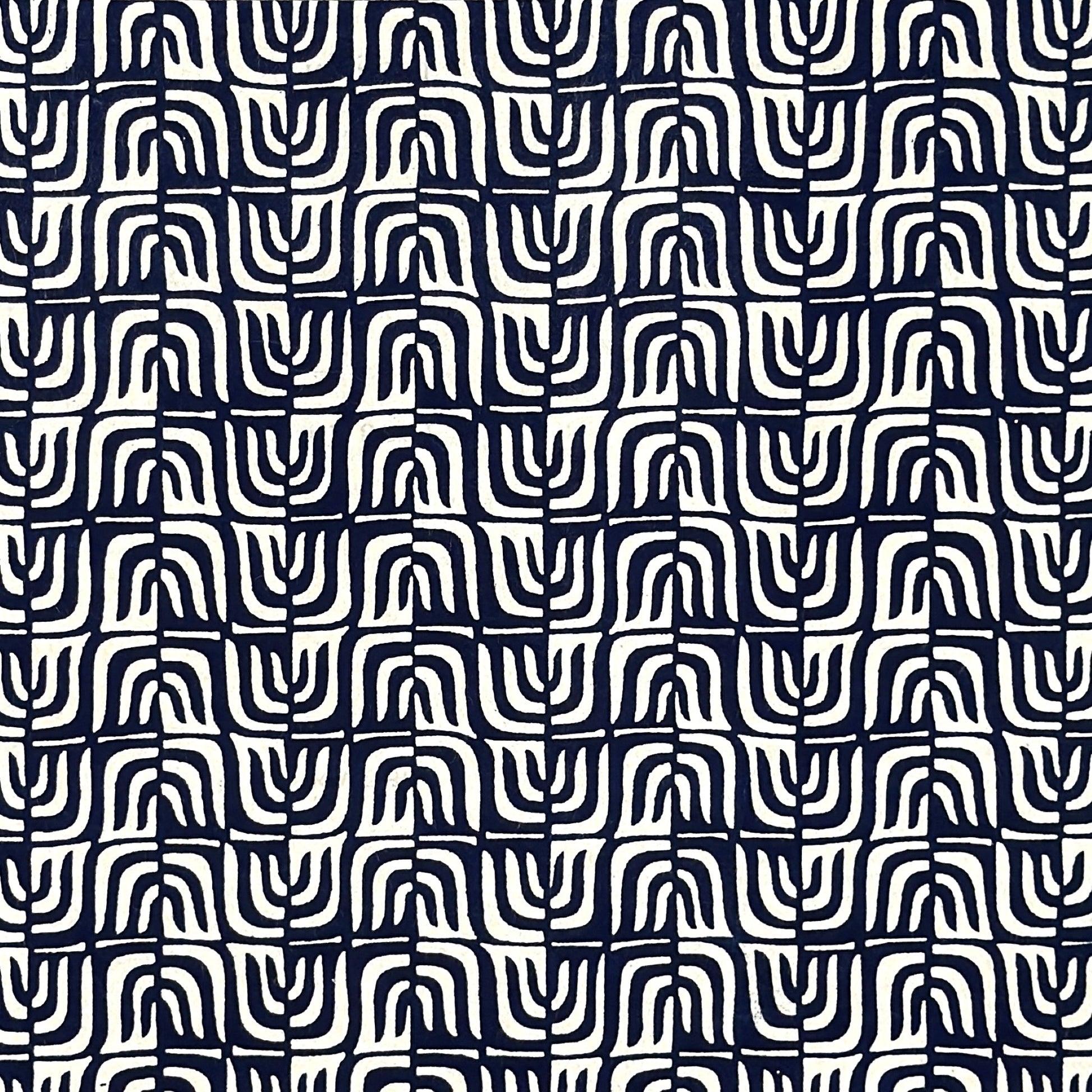 vintage katazome stencil dyed paper. cream paper with a navy wave pattern.