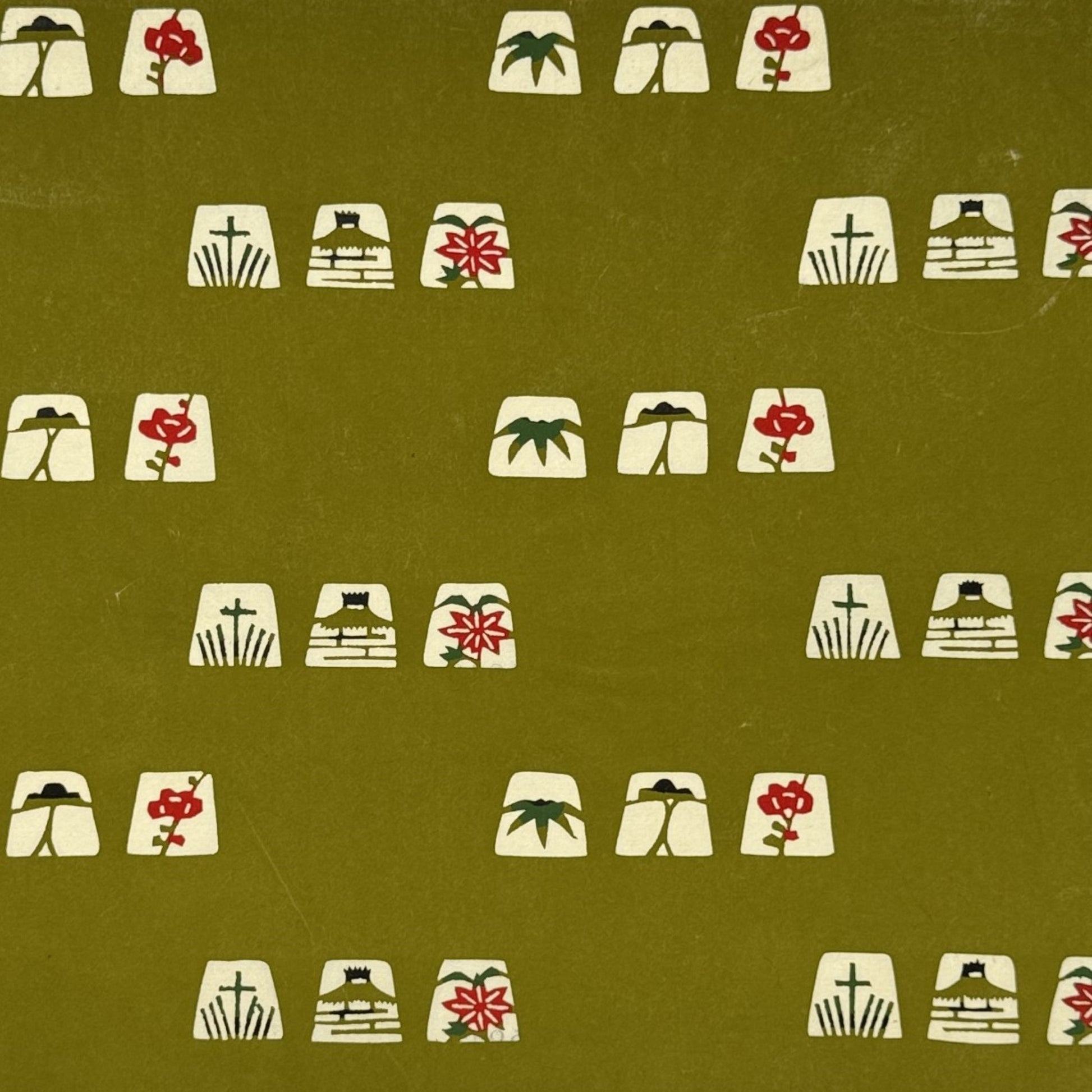 vintage katazome stencil dyed paper. Olive green paper with cream japanese motifs.