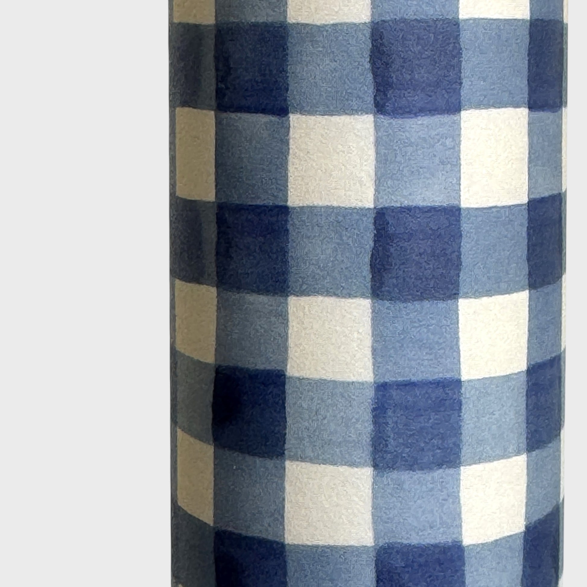blue and white gingham patterned wrapping paper by Wanderlust. Close-up
