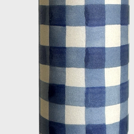 blue and white gingham patterned wrapping paper by Wanderlust. Close-up