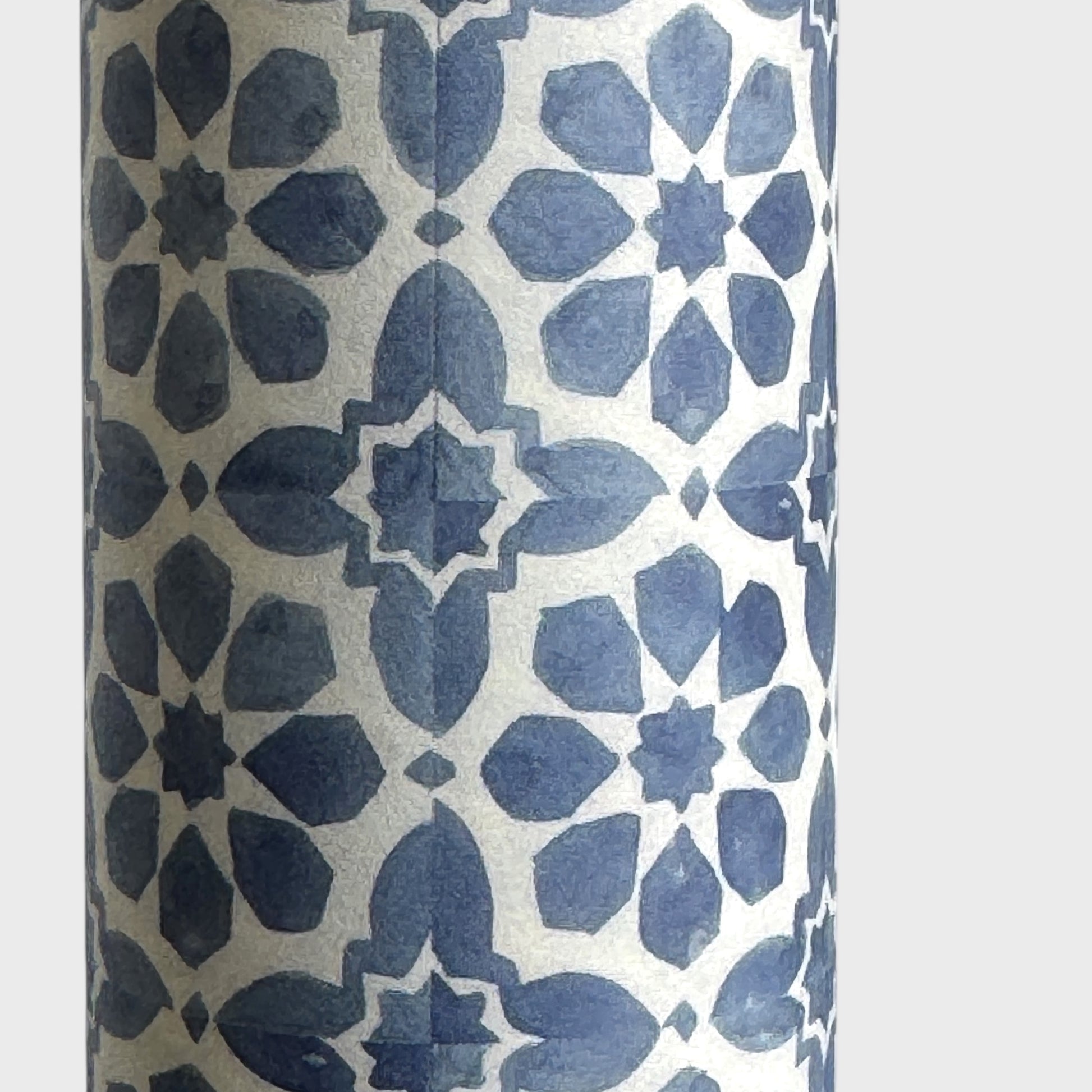 patterned paper / gift wrap with a blue and white tile design. By Wanderlust