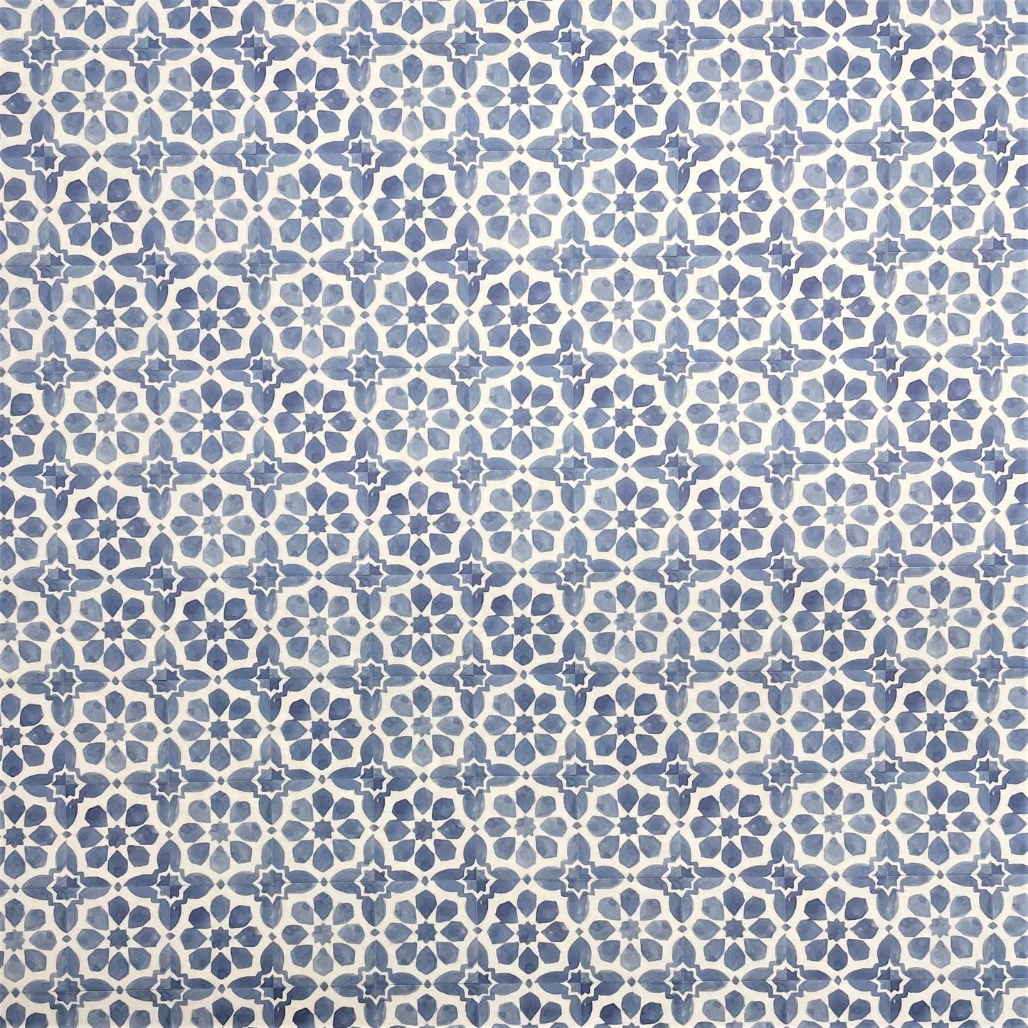patterned paper / gift wrap with a blue and white tile design. By Wanderlust