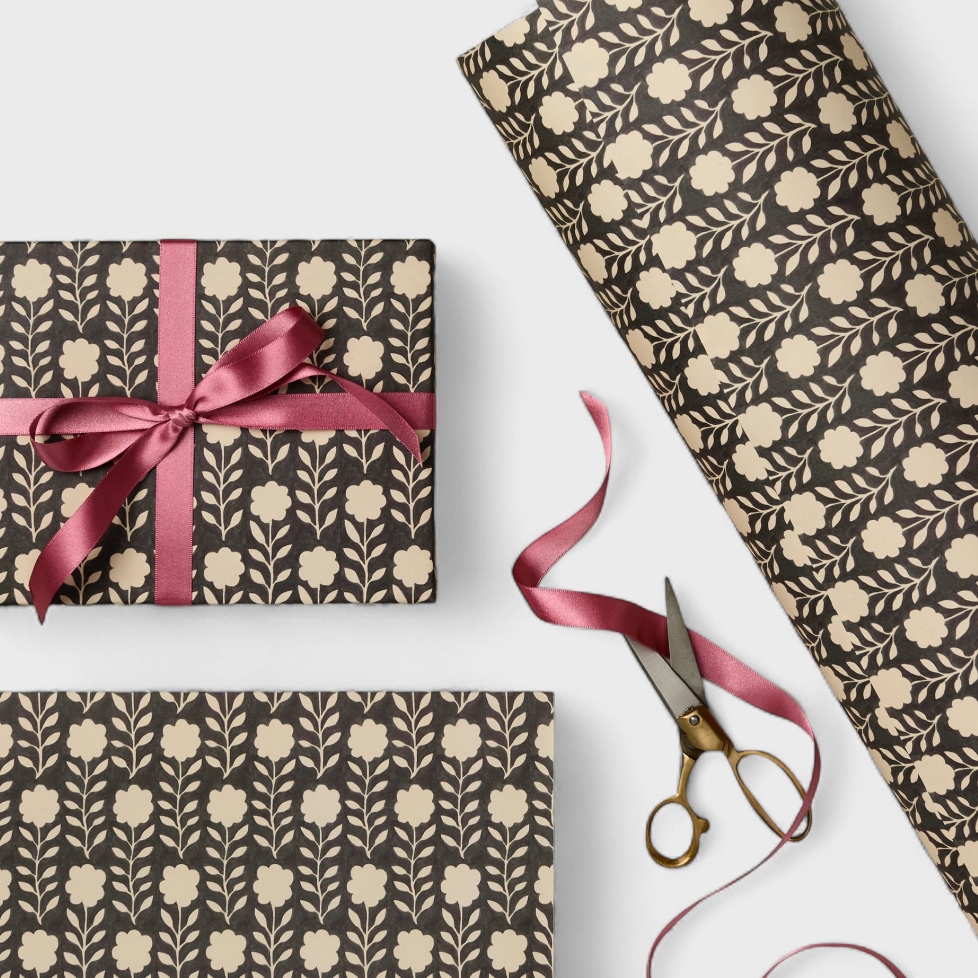 floral patterned wrapping paper in brown and cream. Pictured wrapped