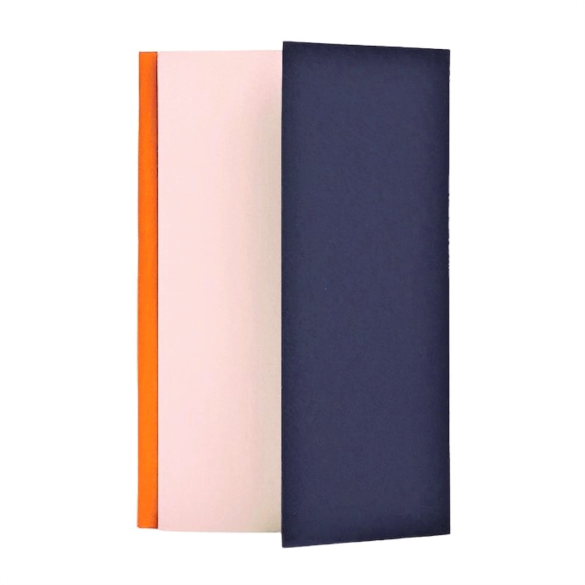 A lined notebook with striped block colours in orange, rose and navy, pictured showing the side fold that is used to protect the pages or as a place mark.