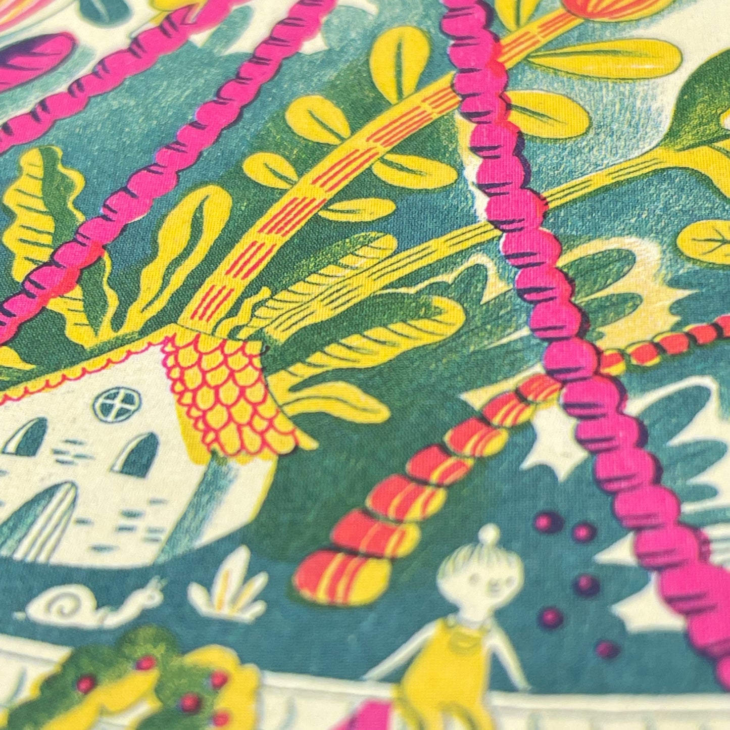 greetings card showing a hanging basket with a mythical botanical world inside, close up of the card