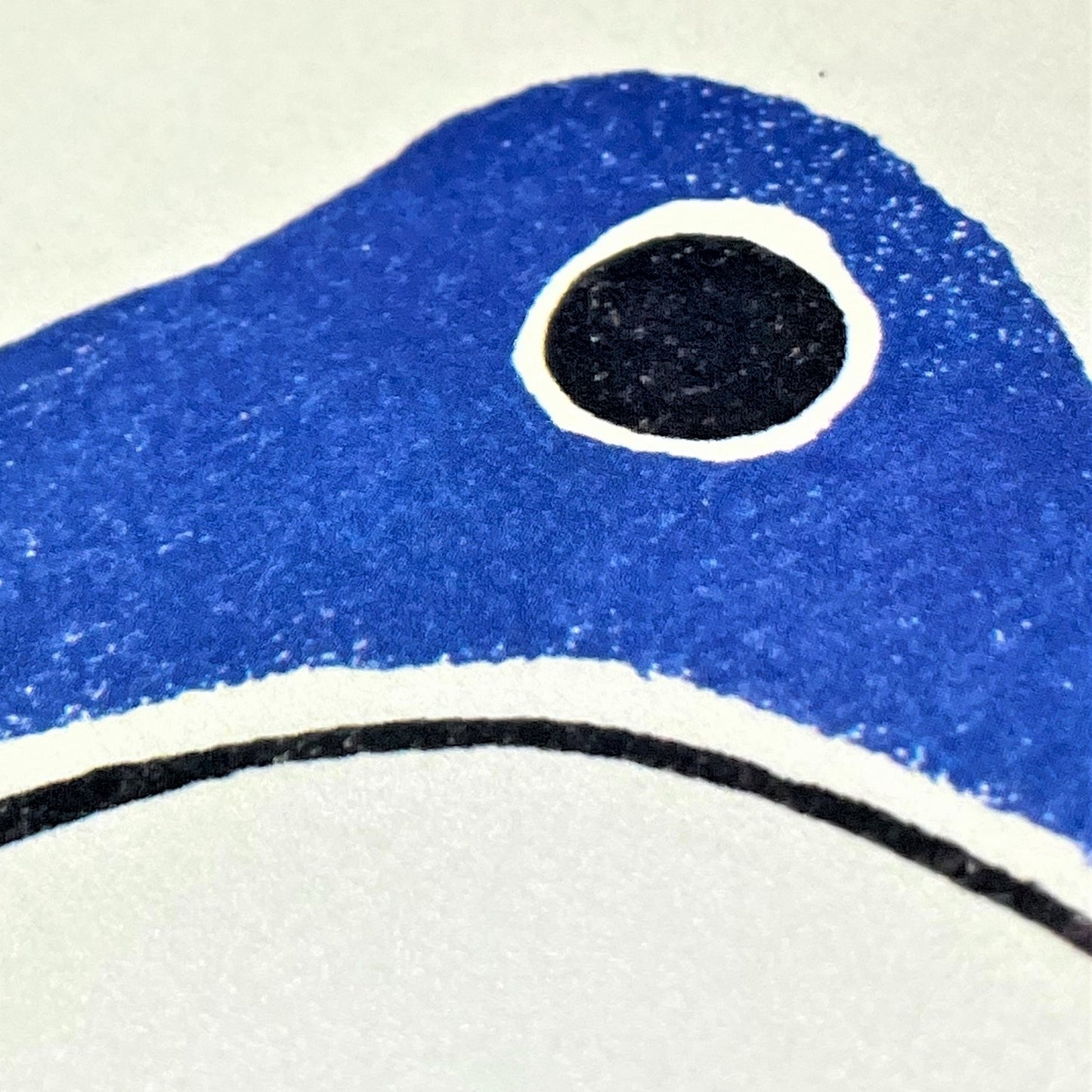 greetings card of a japanese frog coloured blue, close up of the card