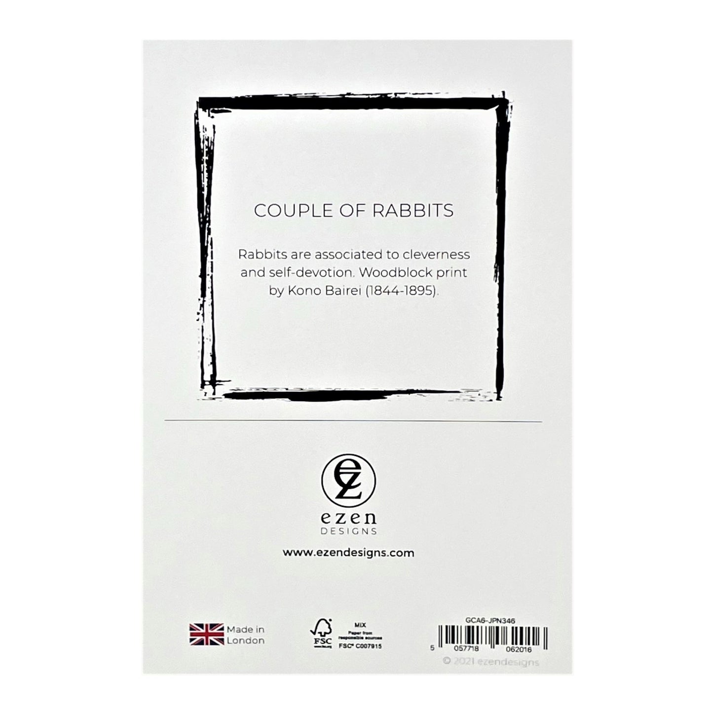 greetings card showing a drawing of one black rabbit and one white rabbit sitting together, reverse of card showing text