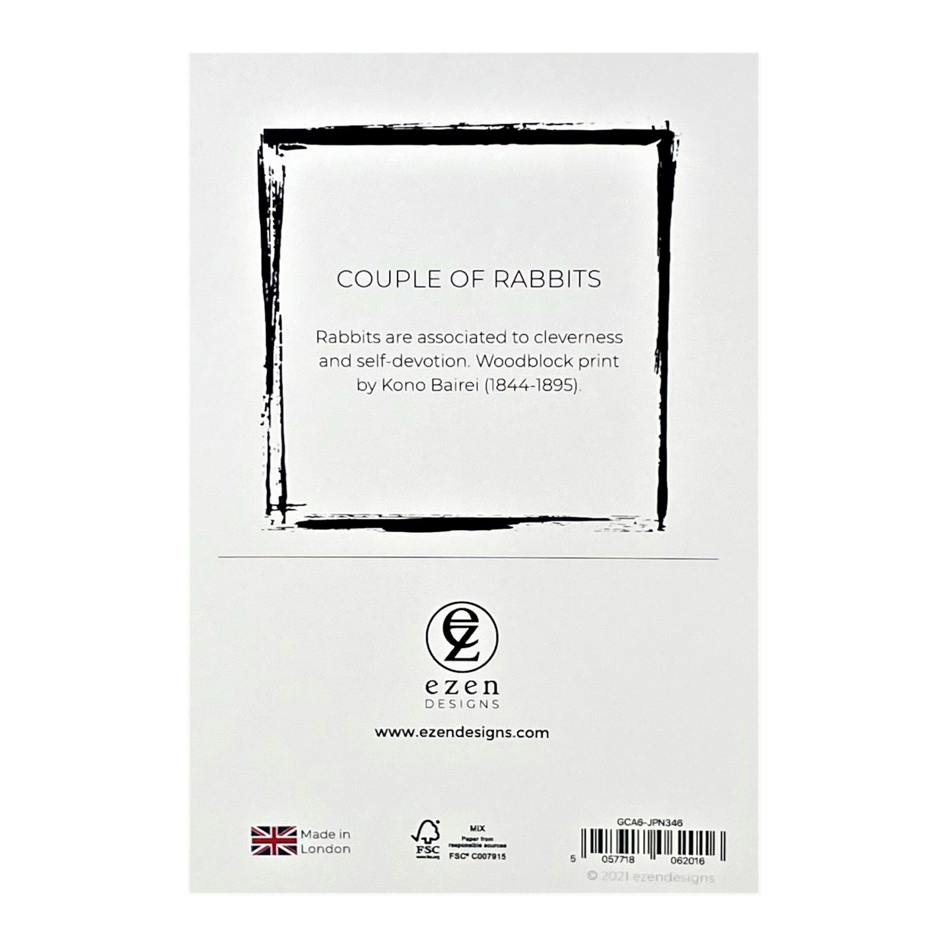 greetings card showing a drawing of one black rabbit and one white rabbit sitting together, reverse of card showing text