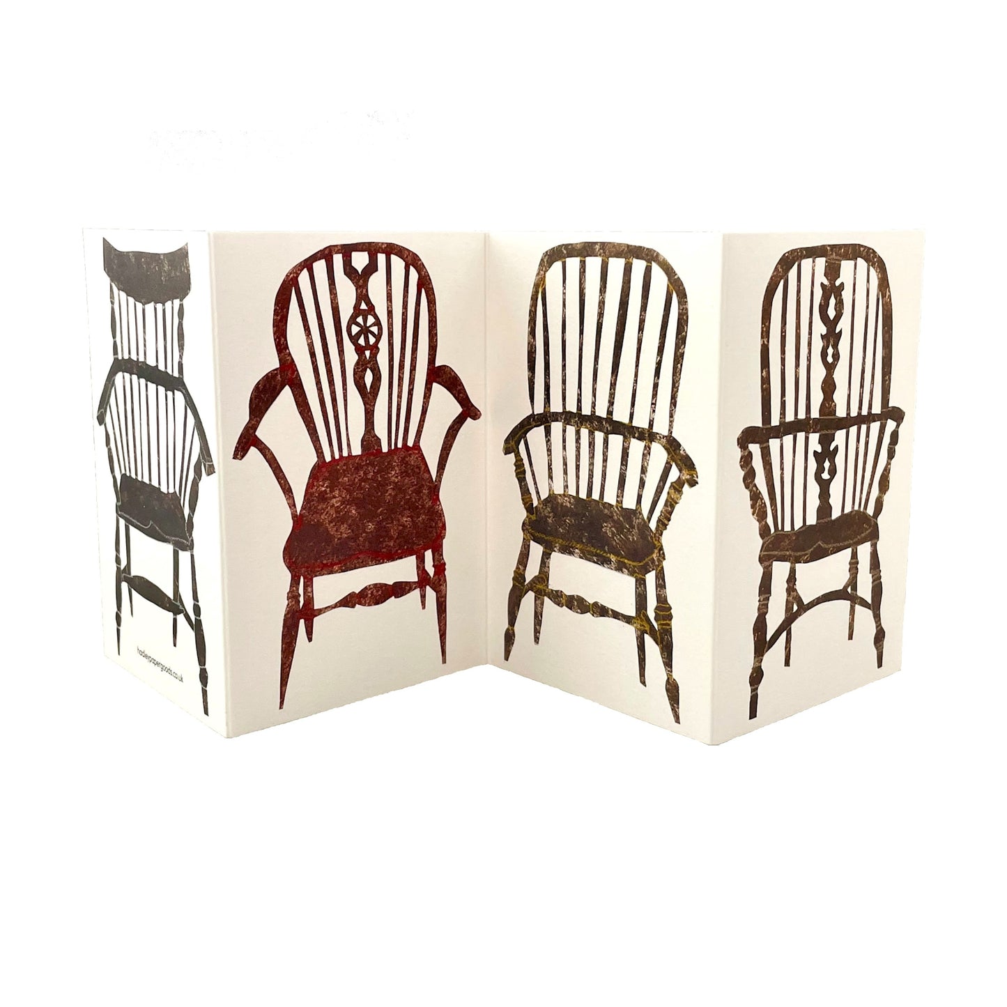 a concertina greeting card with four folds and drawings of four stick-back wooden chairs, by Hadley Paper Goods