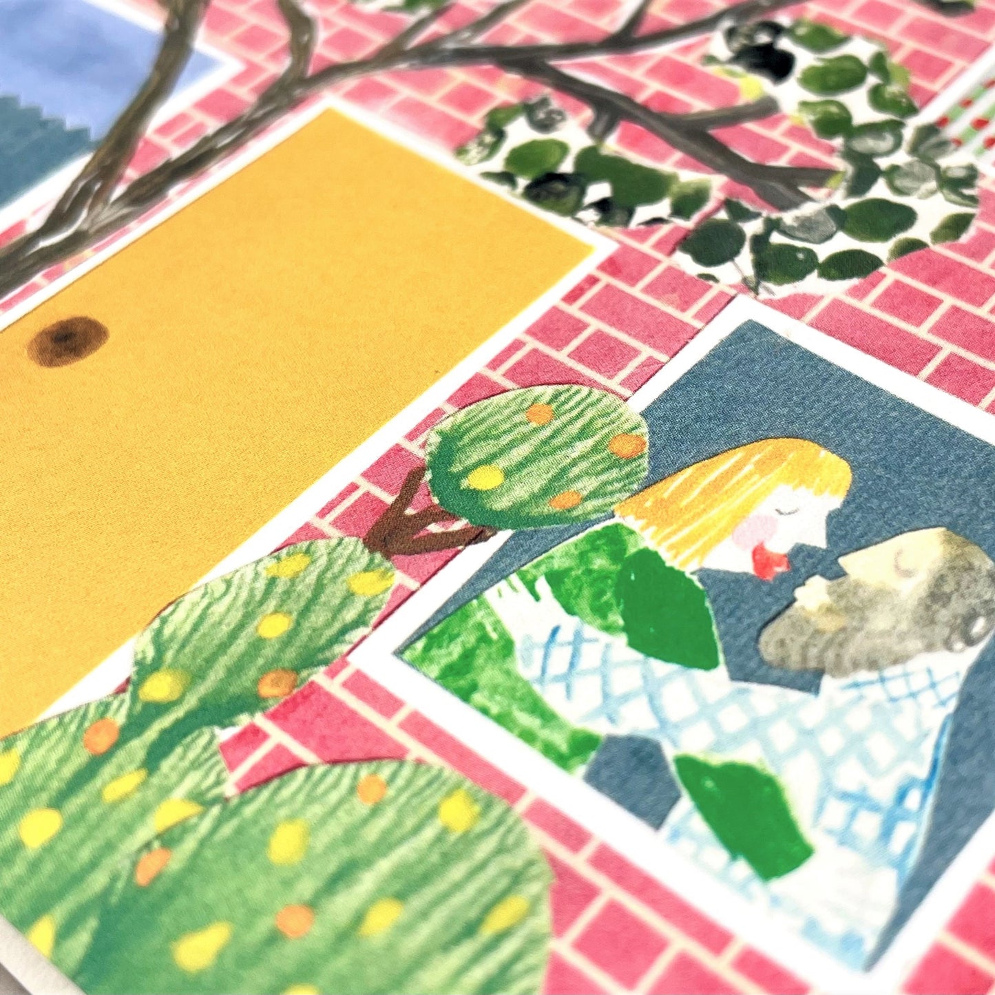 shaped greetings card of a house with four windows and a yellow door, close up of the door and a window