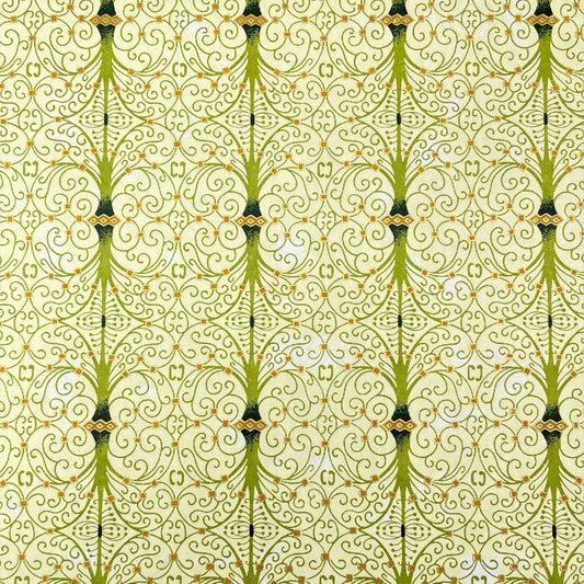 japanese silk-screen handmade paper showing green filigree pattern with gold accents