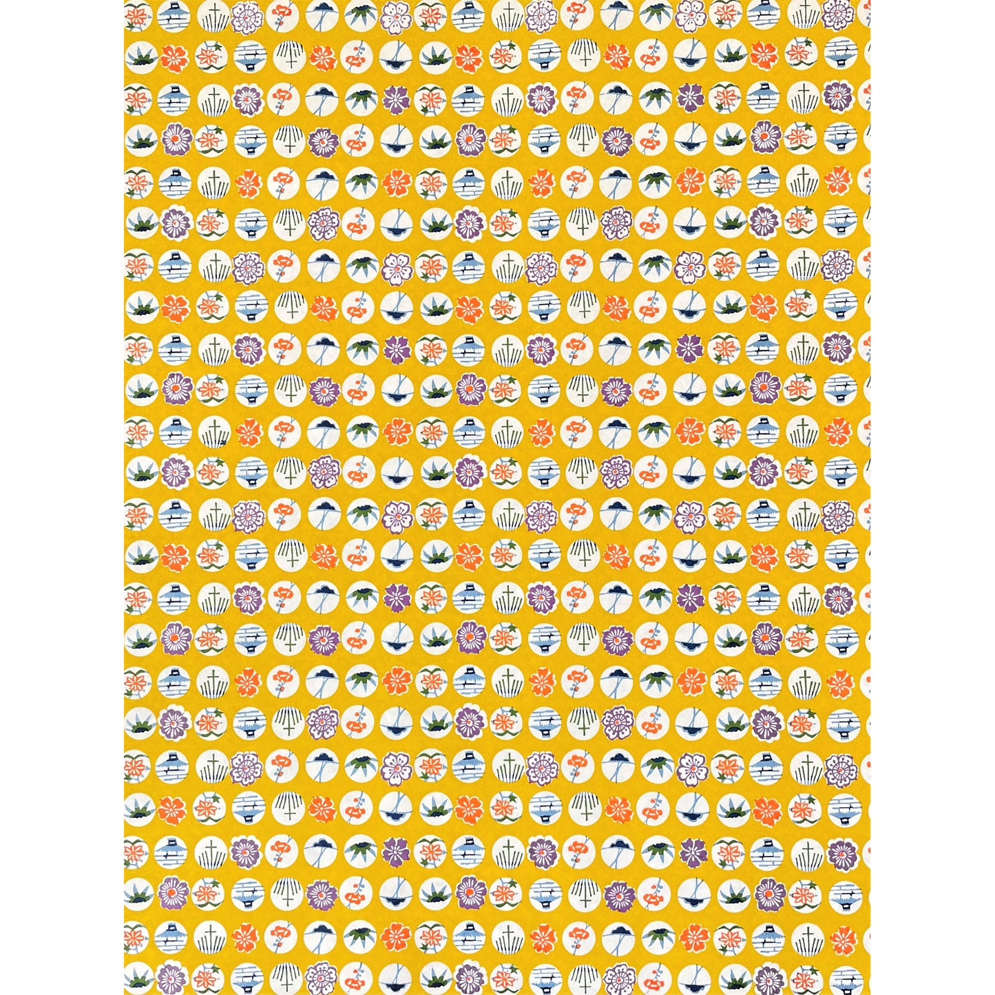 japanese silk-screen handmade paper showing circles of traditional motifs on yellow backdrop, full sheet view