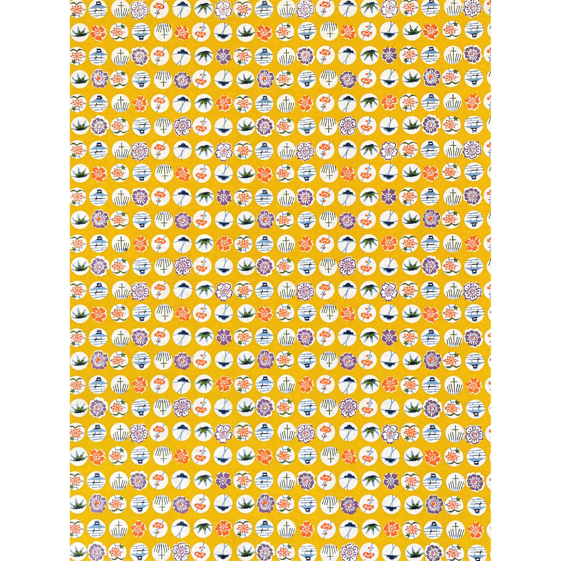 japanese silk-screen handmade paper showing circles of traditional motifs on yellow backdrop, full sheet view