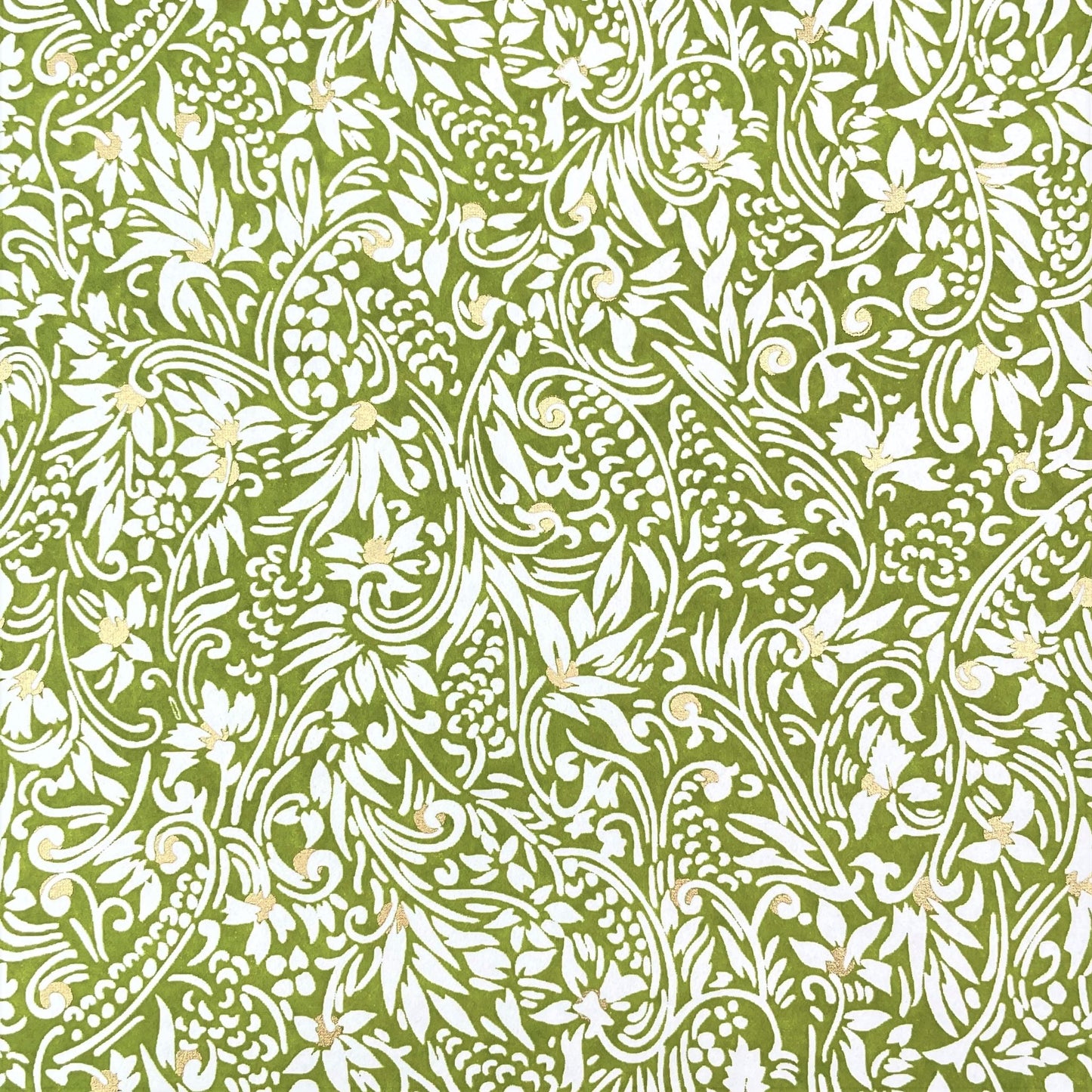 japanese silk-screen handmade paper showing green and white botanical repeat pattern with gold highlights