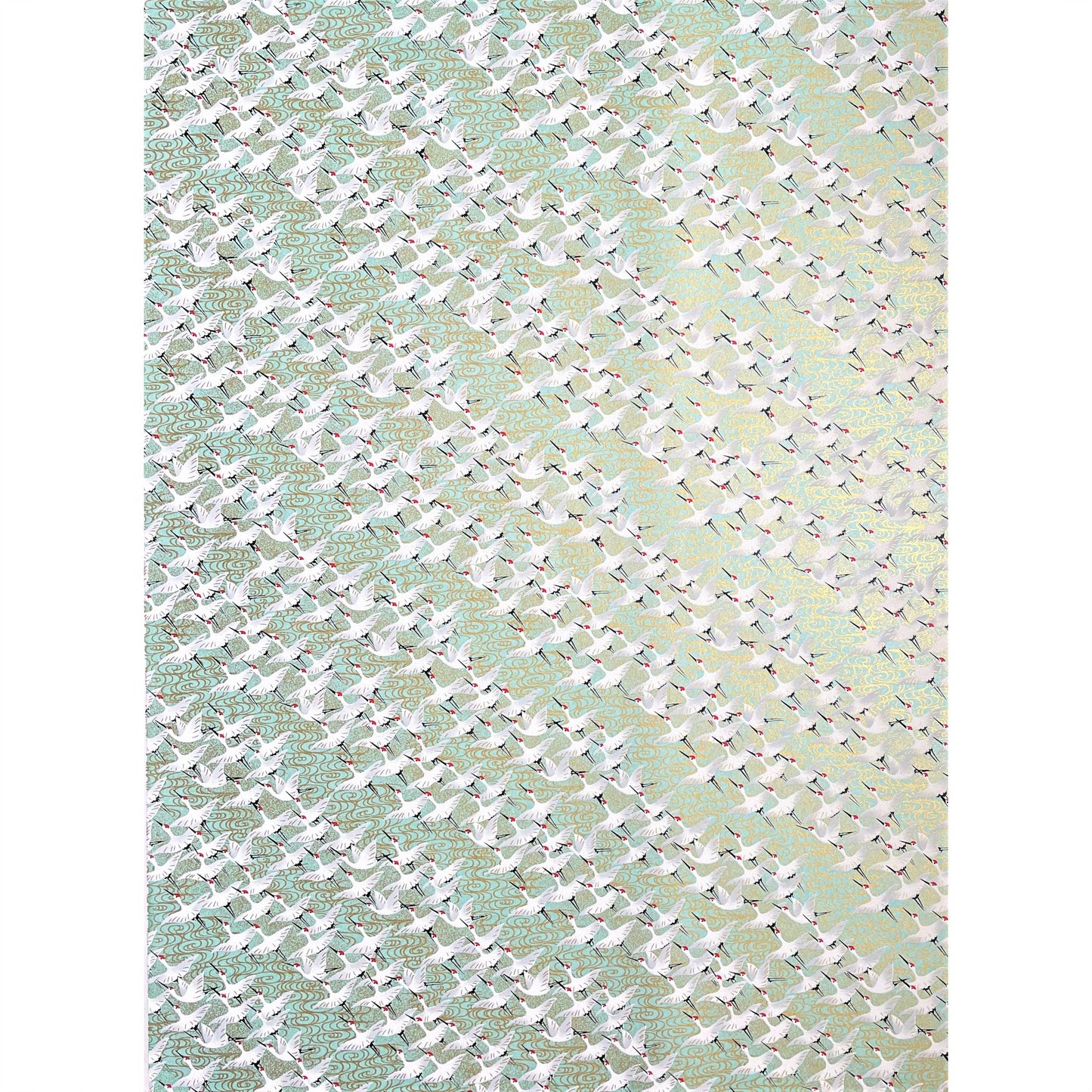 japanese silk-screen handmade paper showing white cranes in flight on a light teal and gold backdrop, full sheet view