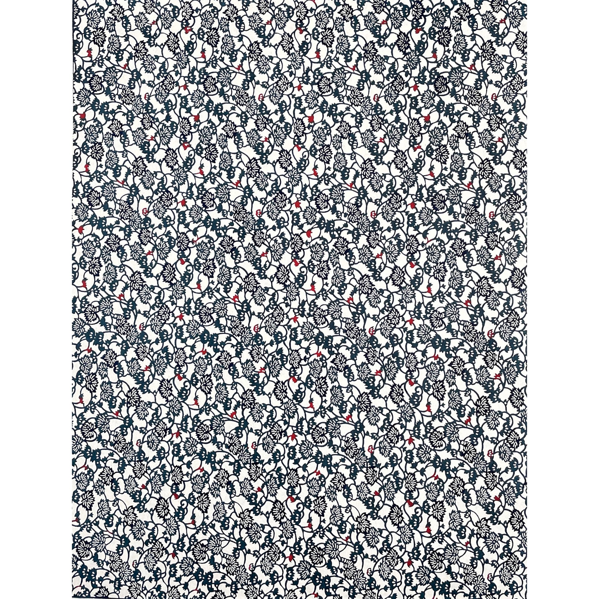 japanese stencil-dyed handmade paper with small scale floral repeat in dark teal and blue, full sheet view