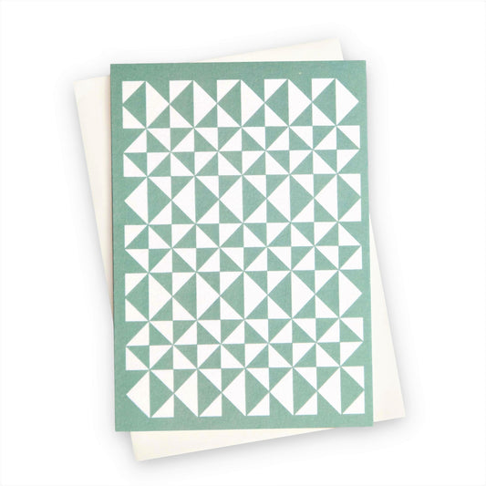 greetings card with abstract triangular pattern in white and aquamarine by Ola Studio