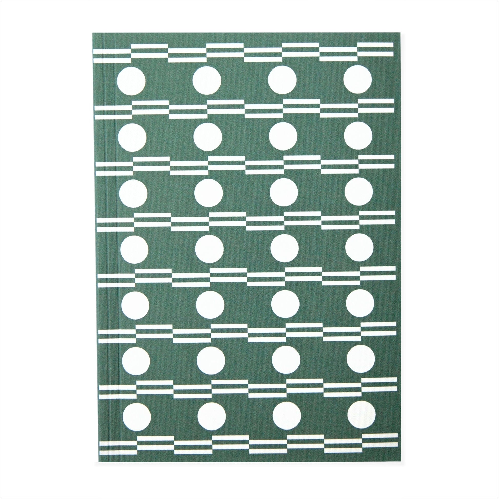 A5 softback 12 week daily planner with geometric green and white circle repeat patterned cover.